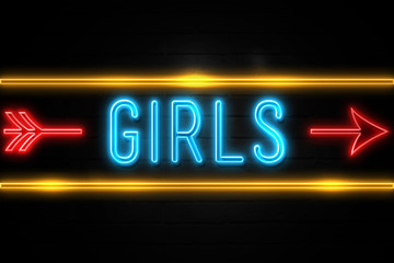 Obraz premium Girls - fluorescent Neon Sign on brickwall Front view