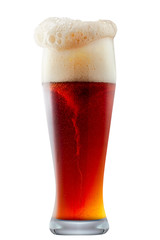 Mug of frosty dark red beer with foam isolated on a white background