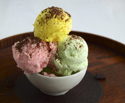 Multi-colored ice cream. A tasty dessert for good mood.