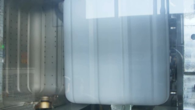 View Through Glass Press Form Opens and Container Transported