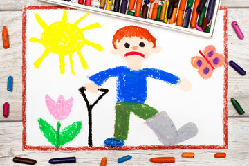Photo of colorful drawing: Sad boy with broken leg