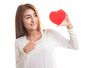 Asian woman point to red heart.