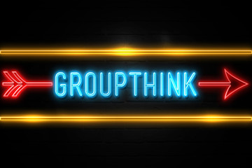 Groupthink - fluorescent Neon Sign on brickwall Front view