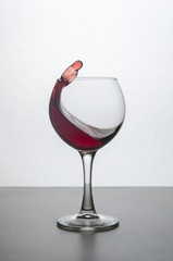 splashing a glass of wine