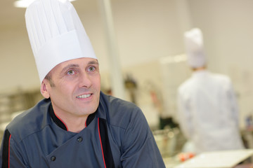 confident male chef in a kitchen