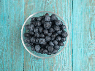 Bowl with fresh blueberries