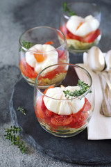Three verrines breakfast. Poached eggs, tomatoes and zucchini