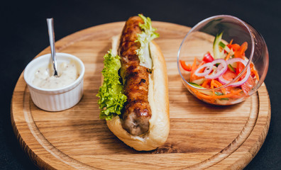 Grilled chicken seekh kebab with fresh bun and cheese.