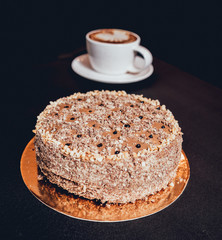 Chocolate cake on dark background.