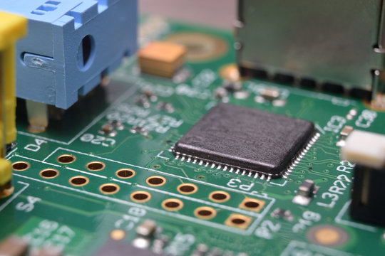 close up of electronic components on pcb board
