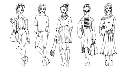 Fashion attractive women in trendy clothes. Outfits for autumn elegant and casual hand drawn with ink pen. Black and white line art.