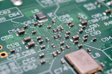 close up of electronic components on pcb board