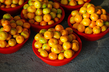 Baskets of Jeju mandarin oranges at a market in South Korea