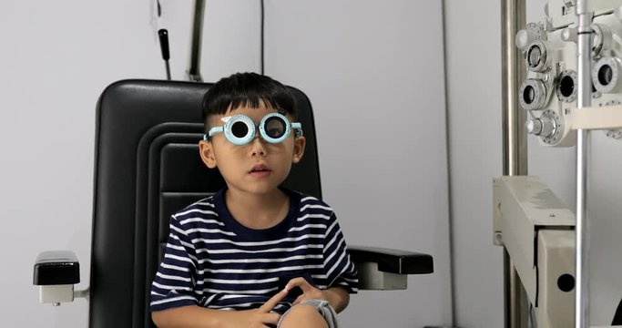 Little boy doing eye test