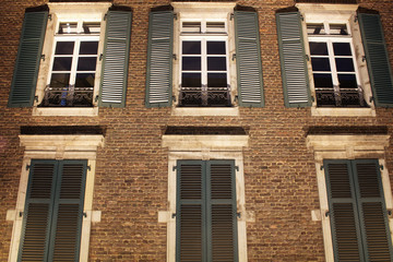 Close up view of old, historical building at night in Dusseldorf. Image shows German architectural style.