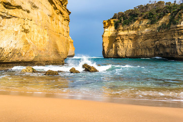 Spectacular bay with beach surrounded by cliffs