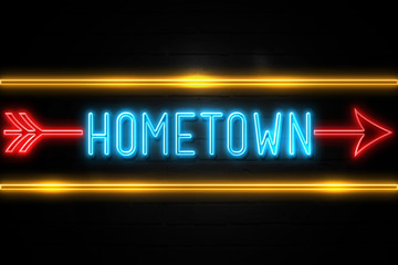 Hometown  - fluorescent Neon Sign on brickwall Front view
