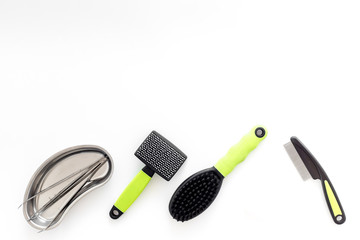 pets cure with tweezers for treatment set on white background top view mock up