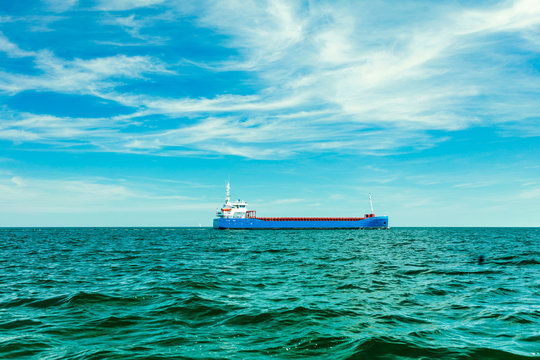 Industrial cargo vessel ship on sea waters