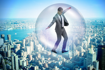 Businessman flying inside the bubble