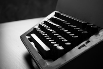 Close up of old typewriter on the table. Black and White tone