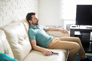 Young man sad about breaking up with his girlfriend