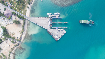 aerial view of Koh Phangan international port with boats in the claear blue sea