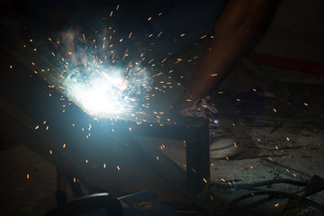 Technicians are welding steel.