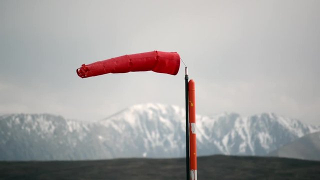 Red Wind Sock on a Windy Day in the Mountains