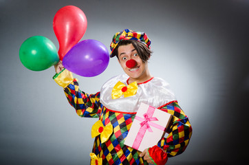 Funny clown in comical concept