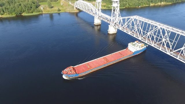 Aerial view of cargo barge on river. Video clip Ultra HD 4K 3840x2160