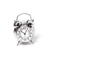 an alarm clock on a white background