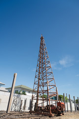 Pile driving machine on construction site.