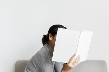 Asian woman reading lifestyle at home