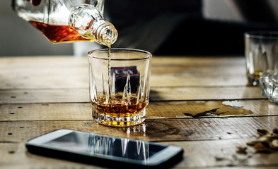 Pouring an alcohol to a glass