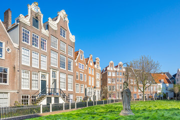 The historic buildings Begijnhof in Amsterdam city, Netherlands