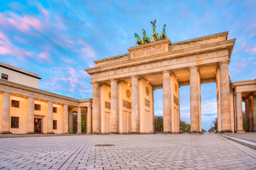 Dramatic sky with Brandenburg gate in Berlin city, Germany