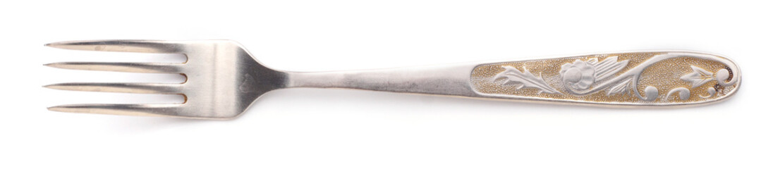 Vintage kitchen old fork with ornament. isolated background