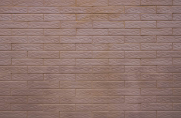 The background of the ancient brick wall is not very close together.