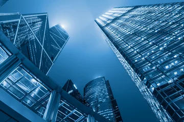 Photo sur Plexiglas construction de la ville Business downtown of Hong Kong at night scene, Center of business, Blue tone