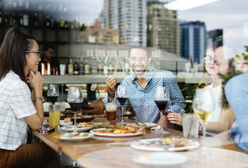 People having meal together in the restaurant