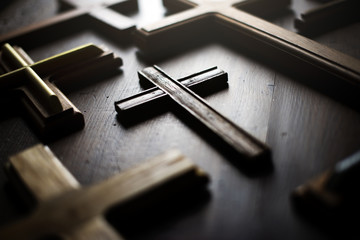 A wooden cross isolated on background