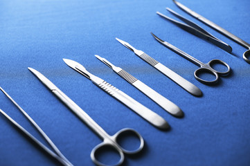 Surgery equipment isolated on blue background