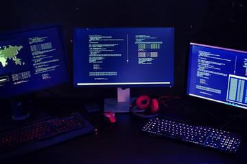 Hacker hacking a coding cyberspace information