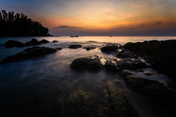Fototapeta na wymiar Beautiful Seascape with sea and rock on sunset background.