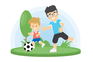 Obraz na płótnie Canvas Father and son playing football.