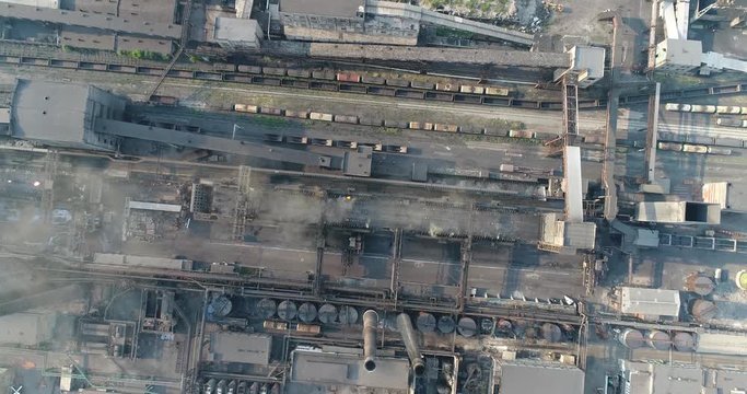 Industrial area top view, View of the industrial object, Courtyard of a factory, Aerial view, Smoke and fire, environmental pollution, environmental pollution, ecological disaster, panoramic view, 4K