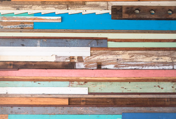 Background made of different coloured timber and scrap materials