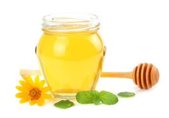 honey with honey dipper isolated on white background