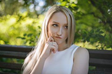 Outdoors portrait of beautiful young woman. Selective focus.